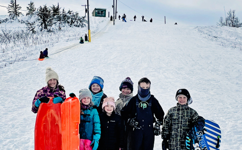 PHOTO COURTESY JEN KOLOUSEK One of the many sledding crews enjoying the hill in Wessington Springs last Tuesday included, left to right: Aunnika Heumiller, Alice Heumiller, Casen Waters, Carlayna Waters, Jace Kolousek, Hastin Heezen and Ethan Heumiller.