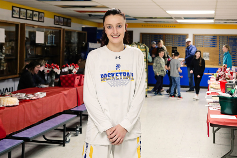 Carissa Scheel is shown in the gymnasium lunch room the night of the event. 