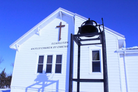 The original bell from the founder of Templeton United Church hangs in front of the current Templeton Church building and is rung regularly on Sundays.