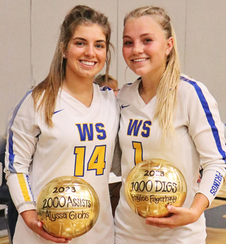 A pair of Wessington Springs High School seniors shared two special milestones in the Hansen Early Bird Volleyball Tournament’s first game vs. AC/DC: 2,000 career assists for Alyssa Grohs (left) and 1,000 career digs for Raylee Fagerhaug (right). PHOTO COURTESY CARMEN WEBER