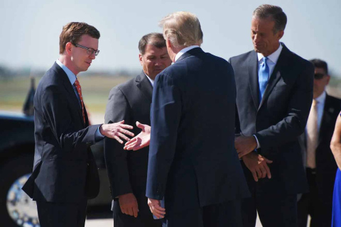 President Donald Trump shakes hands with South Dakota Rep. Dusty Johnson after he lands Friday, Sept. 7, 2018, in Sioux Falls. Trump visited to help campaign for Kristi Noem’s gubernatorial campaign. (PHOTO: ARGUS LEADER)