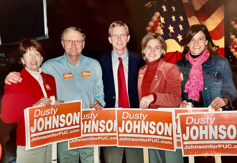 Dusty Johnson poses with wife Jacquelyn (second from right) and her family after being elected Public Utilities Commissioner at age 28 in 2004. He defeated Democratic incumbent Jim Burg. (Photo: Submitted)
