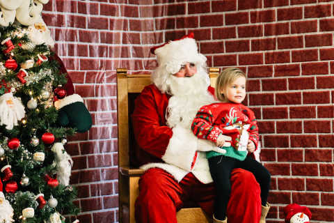 Although reluctant at first, Hazel Schroeder eventually warmed up to the idea of a visit with Santa.  