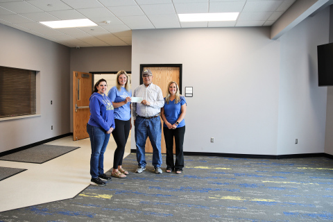 KRISTI HINE / TRUE DAKOTAN Avery Orth presented proceeds from the Farm, Home and Health Show to board members of Build Springs on Monday. Shown left to right are Julie Bruckner, Avery Orth, Roger Hainy and Hilary Grohs.