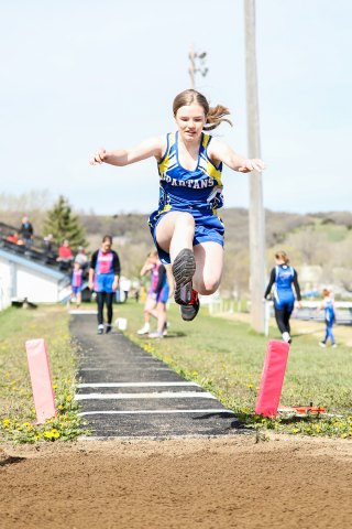  Shown during junior high track and field action at home last week is Madilyn Gaikowski .