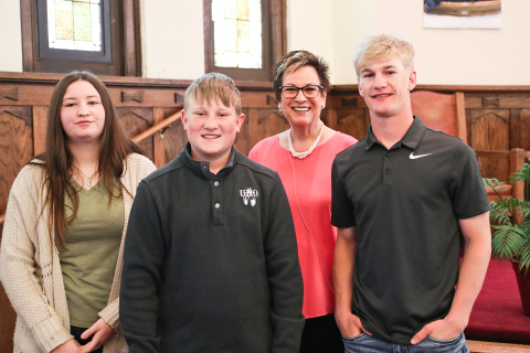 The Wessington Springs Methodist Church family prayed over eighth grade and high school graduates. Pictured left to right are: Bailey Roduner, Ryder Roduner, Pastor Cheri Van Gorp and Blake Larson.