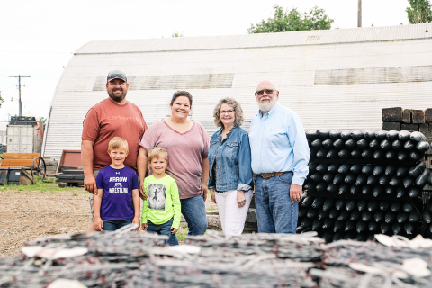 Tim and Cathy Holzwarth announced this week that they sold their ag supply/material and fencing business to Aaron and Chelsea Cashman. Shown back row, left to right: Aaron and Chelsea Cashman, Cathy and Tim Holzwarth. Front row: Hayes and Harvey Cashman.
