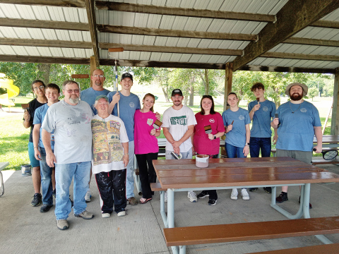 PHOTO SUBMITTED Lester and Eva Voorhess (front left) are shown with out of town volunteers who made recent improvements at the city park picnic shelters.