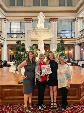 Pictured left to right are Damm, Atkinson, Hine and Ferguson just before sitting down to dine at the world-famous Walnut Room located inside Macy’s on Magnificent Mile. 
