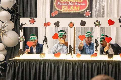 Over 200 local and out-of-town attendees filled the Springs Rec Center Saturday night for the Build Springs Gala, “Pitches and Poker.” The Vegas-themed event served as a fundraiser for improvements at the amateur/teener and little league baseball complexes in Wessington Springs. Springs Owls players served as human slot machines as part of the entertainment. Shown left to right are Cade Mohling, Mason Schelske, Camden Jost and Cale Mohling. KRISTI HINE / TRUE DAKOTAN