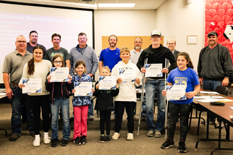 Pictured, back row: BOE members Darrick Van Dyke, Derek Zastrow, Scott Kolousek, Dustin Weber, Gene Gaikowski, Superintendent Dr. Michael Ormsmith, BOE member Jonathan Arhart. Front row: Humm-Dinger owner Jason Zacher, students Remie Roduner, Aliza Bolin, Blair Murphy, Mayzie Miller, Jace Kolousek, Luke Larson, Bailey Mentele. KRISTI HINE / TRUE DAKOTAN