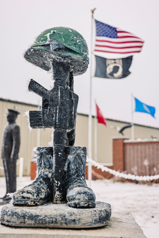The frosty weather created natural art, clinging to the statues at the Alpena Veterans Memorial with a bit of frosty frill on Christmas Eve.