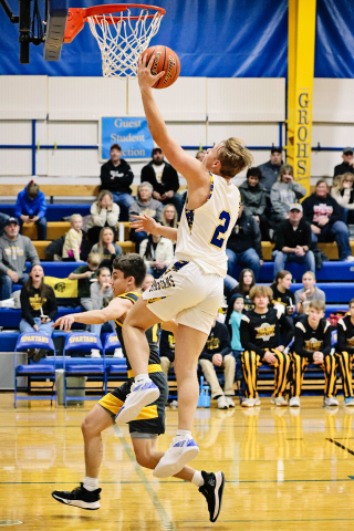 Parker Graff lays up for a score in the 61-24 victory over Faulkton area. 
