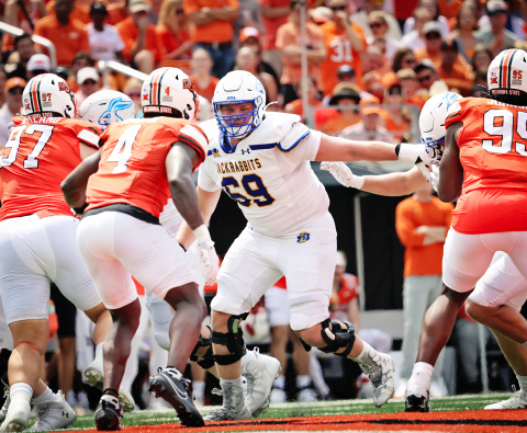 SDSU offensive tackle Quinten Christensen (69) is shown above in the Jackrabbits week one matchup on Aug. 31, 2024 against Oklahoma State. During that game, he incurred a core injury and recently underwent surgery (see editor’s note below). Christensen and QB Chase Mason played an integral role in encouraging teammates and recruits to stick with the SDSU program during coaching staff changes announced earlier this month. DAVID BORDEWYK, SOUTH DAKOTA NEWSMEDIA ASSOCIATION