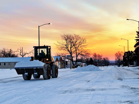 City of Wessington Springs crews were clearing streets against the backdrop of a vibrant sunrise Tuesday morning after the area received 2 inches of snow Monday February 10, 2025.
