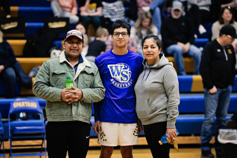 Shown with his parents is Richard Cardona. 
