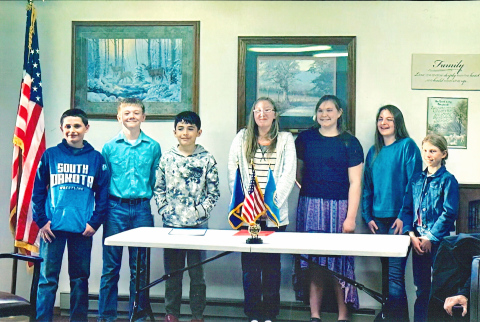 PHOTO COURTESY AMERICAN LEGION AUXILIARY POST 14 Shown left to right are the 2025 American Legion Auxiliary Post 14 essay and poem contest winners: Lorin Schaller, Casen Waters, Dante Colqui, Kylie Edwards, Josie Arhart, Gianna Grohs (local and district winner) and Crawleigh Reiner. Not pictured: Deandra Zastrow and Danny Tuj Mejia.
