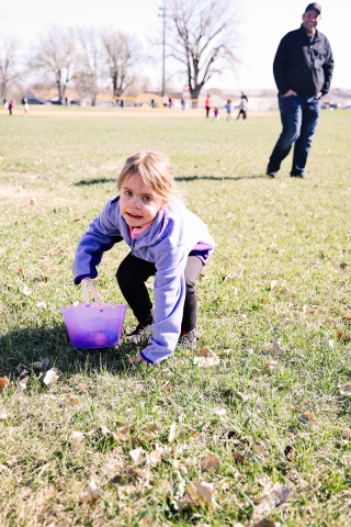 Hazel Schroeder plucks another candy-filled egg from the David Jost Memorial ball field, the designated zone for the youngest of the Easter egg hunters. Schroeder’s dad, Wessington Springs Volunteer Fire Department Chief, Eric, looks on as she happily fills her basket. Just moments after this photo was taken, the fire whistle blew, sending firemen to forego the festivities and don their bunker gear.