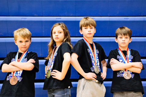 Four Wessington Springs Elementary School students and Pony Hills youth wrestlers brought home some hefty hardware from the state tournament last weekend. Shown left to right are: Kactus Coleman (6th), Mary Tanke (1st), Kaddilac Coleman (2nd) and Kix Koleman (5th). KRISTI HINE / TRUE DAKOTAN 