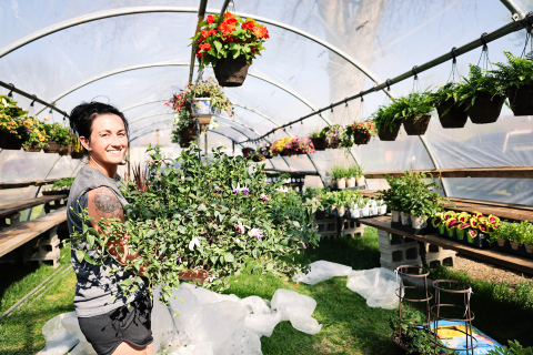 Bethany Schimke, 2nd and Bloom Flower Shop owner, recently purchased the seasonal floral and plant greenhouse formerly known as Petal Pushers from Wessington Springs resident Tony Aldrich. She is pictured  on Sunday, May 4, 2025, unloading a trailer of plants, hanging baskets, vegetables and many other garden goodies that will be available for sale beginning May 10, 2025.