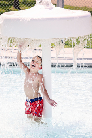 KRISTI HINE / TRUE DAKOTAN Parker Pulizzi splished and splashed at the City of Wessington Springs municipal pool with his grandma, Angie Mentzer (not pictured) on Monday, June 16, 2025.