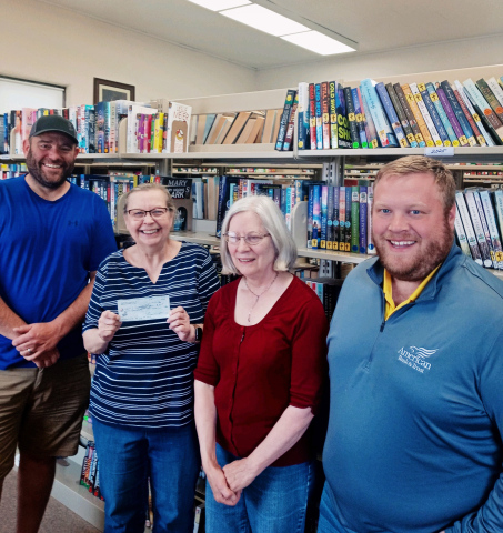 SUBMITTED Show left to right are: Member of Frontier Lodge #87 of Wessington Springs Eric Schroeder, Carnegie Library Librarian Rhonda Behrens, Assistant Librarian Gretchen Burnison, Member of Frontier Lodge #87 of Wessington Springs Blake Willman.
