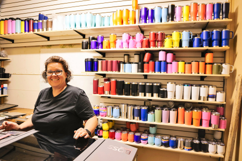 After a life-altering health crisis forced her to close the floral side of Baker’s Design in Wessington Springs earlier this year, Laura Baker is now embracing a fresh start — a “reboot” of her Main Street business. She’s excited about renewed focus on the giftware, embroidery, screen printing, and newly added laser engraving side of the business.
