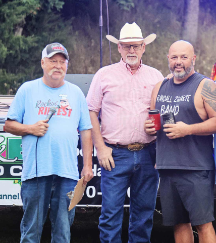 Mike Roti’s Mustang Team claimed the top prize at this year’s Rockin’ Ribfest. He is shown (right) with Wessington Springs Area Development (WSACD) Chairman Darrell Deneke and WSACD board member Phil Wipf. (PHOTO BY KATIE DENEKE)