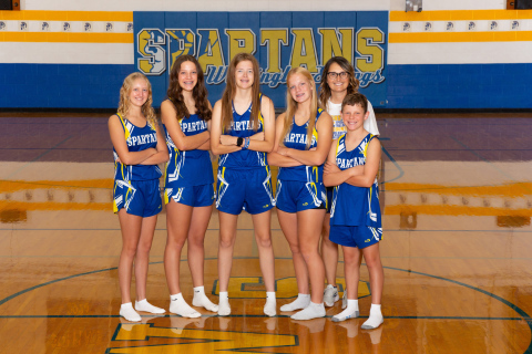 The Wessington Springs Cross Country Team is shown left to right: Alexis Roesler, Aunnika Heumiller, Masynn Mebius, Ella Kolousek, Coach Becky Krueger and Ethan Heumiller. (PHOTO COURTESY MARK’S PHOTOGRAPHIC IMAGES) 