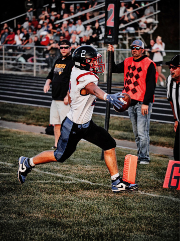 Wesley Molnar racked up 115 rushing yeards and two touchdowns on 11 carries.  (PHOTO COURTESY J. VONEYE IMAGES)