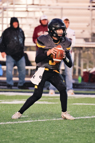 Ty Boomsma is pictured during a soggy football homecoming match up vs. Platte-Geddes Friday.