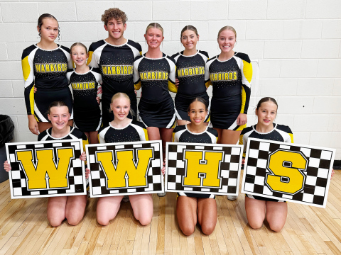 Warbird Competitive Cheer Team – Front row (L–R): Skye Tschetter, Amanah Woodruff, Abigail Huntsinger, Raya Toupal. Back row (L–R): Preslie Jensen, Taryn Rainford, Carson Walters, Allison Hulst, Lily Hoverson, Shae Uttecht. (PHOTO COURTESY BRANDEE KELSEY)