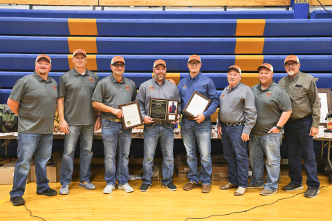 Darwin Weeldreyer is joined by fellow Wessington Springs Pheasants Forever Chapter #835 members as he proudly displays his Hall of Fame plaque and the official proclamation declaring October 17, 2025, as Darwin Weeldreyer Day in South Dakota. Shown left to right are: Chapter President Paul Sheldon, Chapter Members Mike Krueger, Brian Bell, Brady Younie, Darwin Weeldreyer, Steve Winter, Blake Willman and Tom Riddle. 