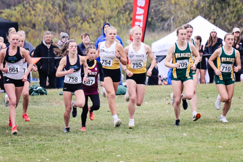 Wolsey-Wessington runners Kendal Uttecht and Mya Flemming compete at the State Cross Country Meet held at Broadland Creek National Golf Course in Huron. 