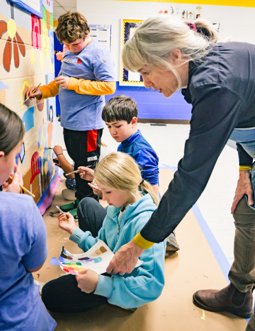 Elementary Students Bring the Arts to Life with Visiting Muralist Mary Wipf