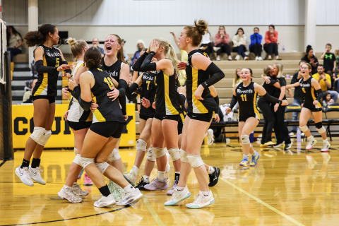 The Lady Warbirds celebrate after sweeping De Smet in straight sets during Round 3 of Region 3B play on Nov. 6 in Wolsey. The win advanced Wolsey-Wessington to the SoDak 16 and one step closer to a berth in the state tournament.