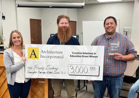 WSHS Vo-Ag Instructor Brady Duxbury (right) is awarded a grant from Architecture Incorporated.