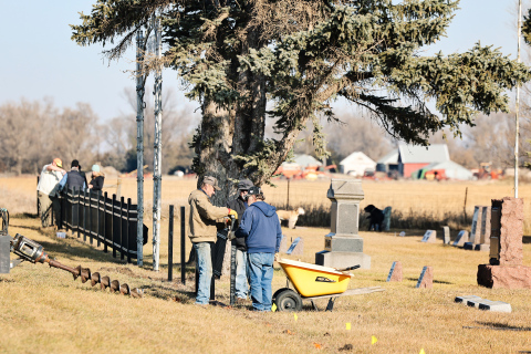 Volunteers install new fencing at Hope Cemetery as part of ongoing preservation and improvement efforts aimed at honoring the cemetery’s history while ensuring its care for future generations. The original entrance to Hope Cemetery has been carefully preserved, maintaining a visible connection to the site’s history and the generations it serves.
