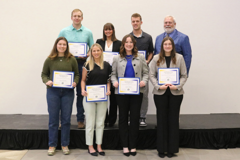 Cheyenne Burg (front row, second from left) was recently named the winner of the William M. Griffith and Byrne S. Griffith Endowment scholarship at the SDSU College of Agriculture, Food and Environmental Sciences Scholarship and Recognition Banquet. She is pictured with SD Corn Endowed Dean of the college, Joe Cassady and other endowment winners. (PHOTO COURTESY SDSU)