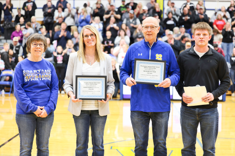 From left: WSHS Athletic Hall of Fame committee member Julie Kraft, 2026 inductee Sarah (Horsley) Larson, Mike Mebius accepting on behalf of the Richard Cutler family, and Dylan Schimke, founder of the WSHS Athletic Hall of Fame, during Friday’s induction ceremony.