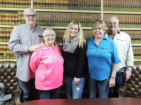 True Dakotan founders Duke and Karen Wenzel (left) and Penny and Craig Wenzel (right) stand with Kristi Hine after signing papers transferring ownership of the newspaper on Jan. 30, 2015. Hine officially took over as publisher on March 1, 2015. Eleven years later, the commitment to local, independent journalism and the community support that sustains it remain as important as ever. (TRUE DAKOTAN FILE PHOTO)