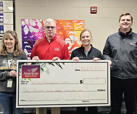 Wolsey-Wessington Warbirds received an AB&T Spirit Card check for $3,764 to help fund classroom books, the Humanity Launch program, and other supplies. Shown left to right are: Wolsey-Wessington English/ Journalism teacher Karen Jensen; Jim Babcock of AB&T Wolsey branch; Leslie Tvedt, Wolsey Wessington MS/ HS Principal and Matthew Teel of AB&T Wolsey branch. 