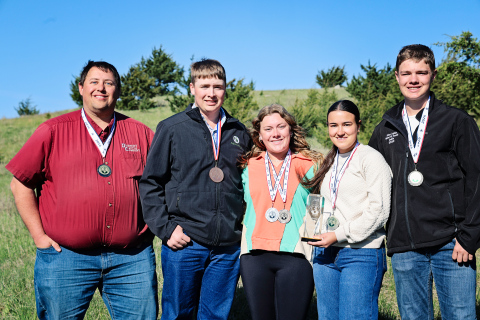 National champions returned home with hardware in hand as Vo-Ag Advisor Brady Duxbury joined Max Klein, Ella Fagerhaug, Remie Roduner and Kohen Mebius at the land judging practice site west of Wessington Springs following the 2026 National Land and Range Judging Contest in Oklahoma City. The Wessington Springs FFA homesite team captured the national championship title, while Klein was also named national individual champion. (KRISTI HINE / TRUE DAKOTAN)