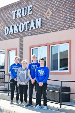 Wessington Springs High School journalism students Gavin Brandenburg, Zandon Beyer, Ethan Amick and Damien Knippling reflect on a semester of developing writing, interviewing and communication skills while covering local stories. (KRISTI HINE / TRUE DAKOTAN)