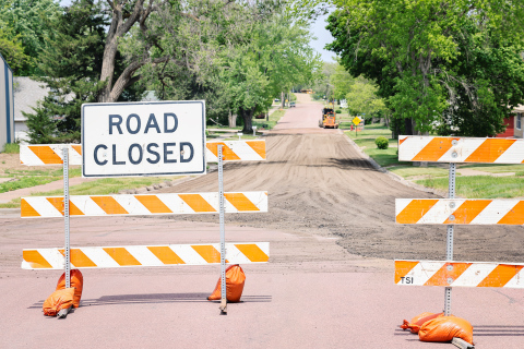 A road closure sign blocks traffic at the intersection of First Street and Barrett Avenue in Wessington Springs as crews continue work on the city’s water main replacement project. City officials are asking residents to respect all road closures and allow extra travel time while construction is underway. (KRISTI HINE / TRUE DAKOTAN)