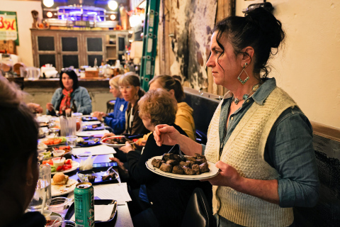 Heather Larson of Sweet Grass serves beef samples during a cooking demonstration that allowed Women’s Ag Network attendees to compare how different cuts and cooking methods affect tenderness and flavor. (KRISTI HINE / TRUE DAKOTAN)