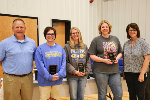 Wessington Springs School District Superintendent Jason Kolousek, left, and Wessington Springs Elementary Principal Becky Fjerstad, right, join Teachers of the Year recipients Niki Hainy, Kim Orth and Sarah Larson following the presentation of the district’s annual staff awards. The three elementary educators were recognized for their dedication to student success and their positive impact on the school community.