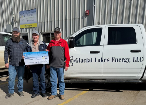 Steve Birkholtz, GLE Board of Director presents funds to Wolsey Fire Association to purchase much needed equipment which includes harnesses, rope and rigging gear needed in grain bin rescues or other falls. 