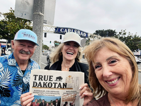 Glenda (Grohs) Key, center, and Monte and Lana (Swanson) Fastnacht pause for a photo with the True Dakotan during an unexpected reunion in downtown Carlsbad, Calif. Glenda and Monte were country neighbors and attended Central School together. The longtime friends were thrilled to reconnect while the Fastnachts were passing through the area during their travels. (PHOTO COURTESY GLENDA KEY)