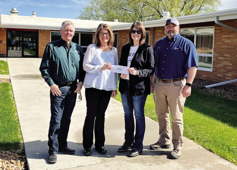 Shown during a check presentation at Weskota Manor Avera in Wessington Springs, left to right are: Brian Bergeleen, District 2 Venture Communications Board Member; Nikki VonEye, Weskota Manor Avera Administrator; Mary Knox, Marketing Manager at Venture Communications Cooperative; Scott Miller, Venture Communications IR Tech. COURTESY PHOTO 